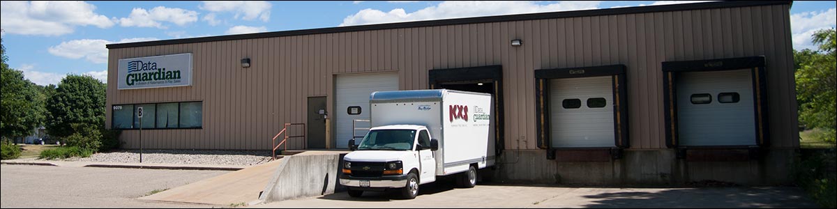 Storage facility with Data Guardian truck parked at dock